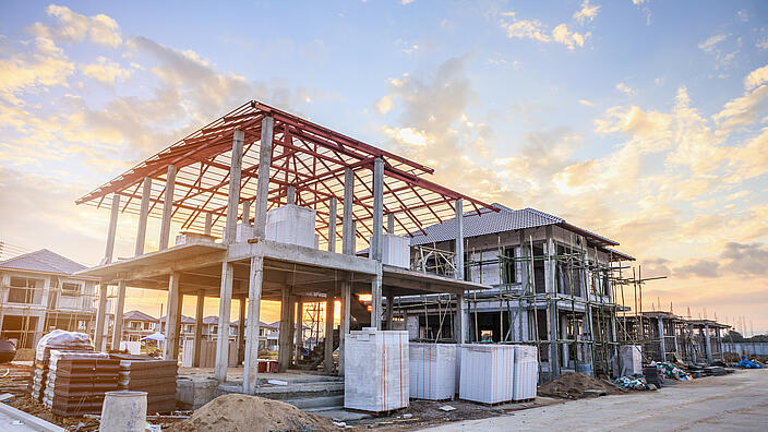 construction residential new house in progress at building site