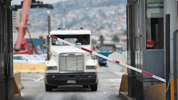 Truck driving up to tollgate