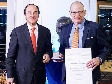 Snower Melitz BHP 2016 Kiel Institute Snower and Melitz presenting certificate