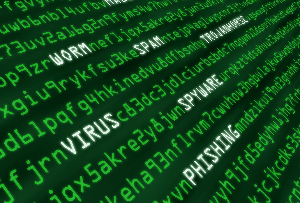Green digital text highlighting words related to a computer virus