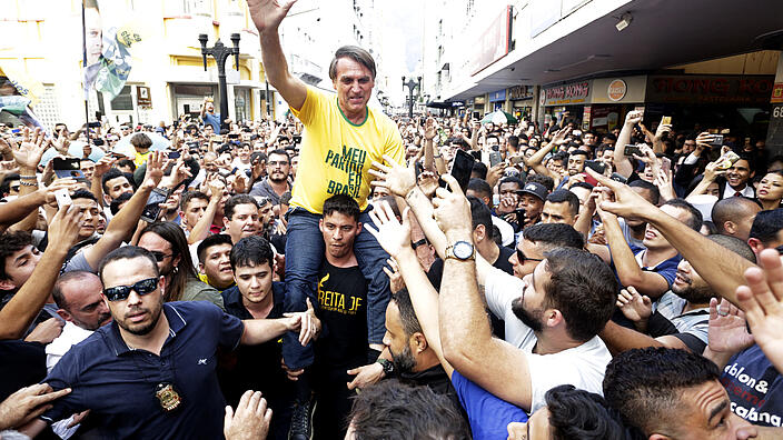 Jair Bolsonaro in a crowd of supporters