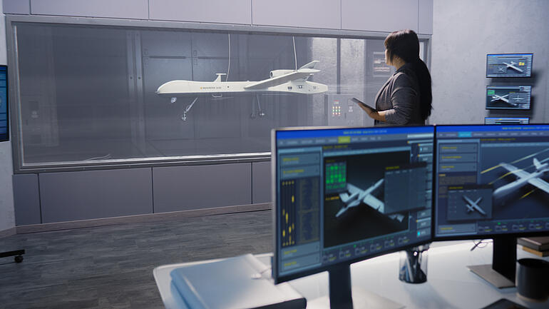 Engineers check aerodynamics of new development drone in laboratory for modern modifications using wind tunnel with steam