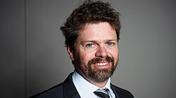 Portrait Picture of Kiel Institute Research Director Wilfried Rickels