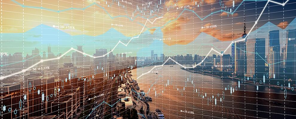 Financial graph overlay on city skyline