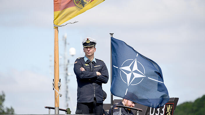 Seaman on top of a German navy ship