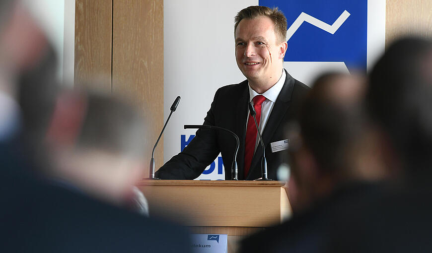 Jens Südekum on stage