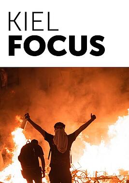 Cover Kiel Focus Rioters in front of fire