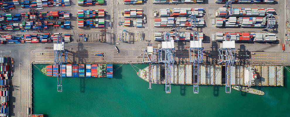 Container box loading by crane, Vessel boat in logistic Singapore port, transportation, delivery and business concept