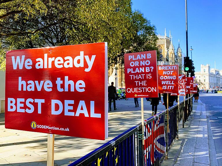 Brexit Posters lined up beside a street
